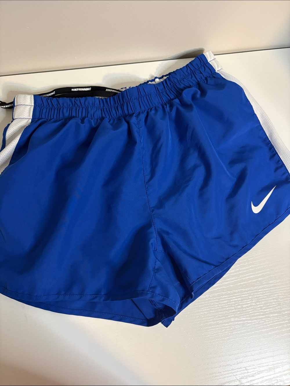 Nike Women's Royal Blue Athletic Shorts with White Swoosh